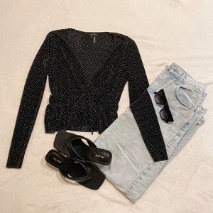 Long sleeve dressy top. Perfect for a cute outfit.